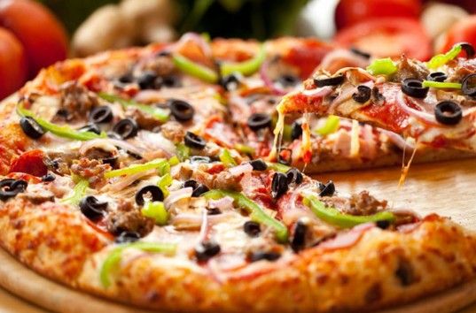 Услуга доставки пиццы на дом выходит на европейский уровень — уже мало кто ее готовит дома