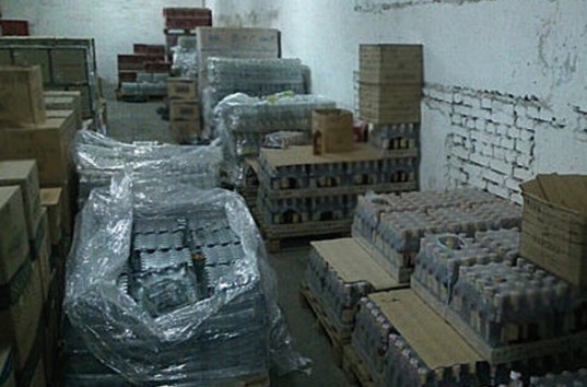 В Днепропетровской области полиция изъяла почти 600 тысяч бутылок фальсифицированной водки